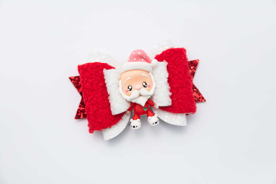 Santa in Pj's 4.5 inch Maria Clay Bow